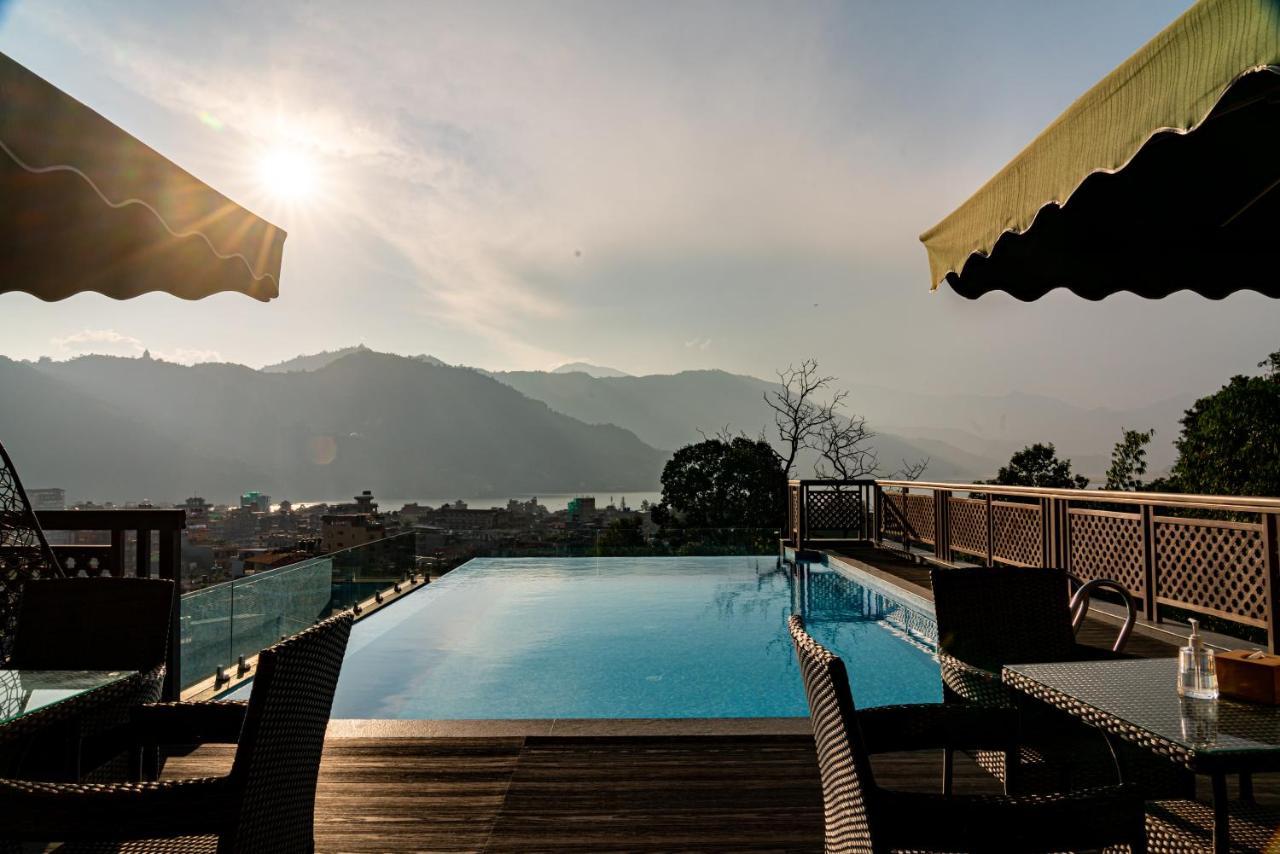 Bar Peepal Resort Pokhara Eksteriør billede The swimming pool at the hotel