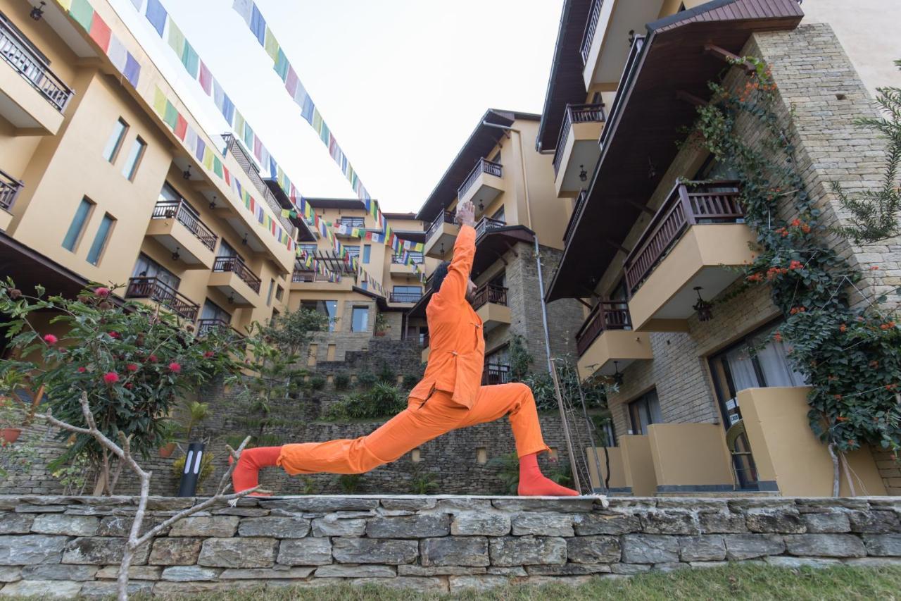 Bar Peepal Resort Pokhara Eksteriør billede A student of the Drepung Loseling Nunnery, practicing yoga.