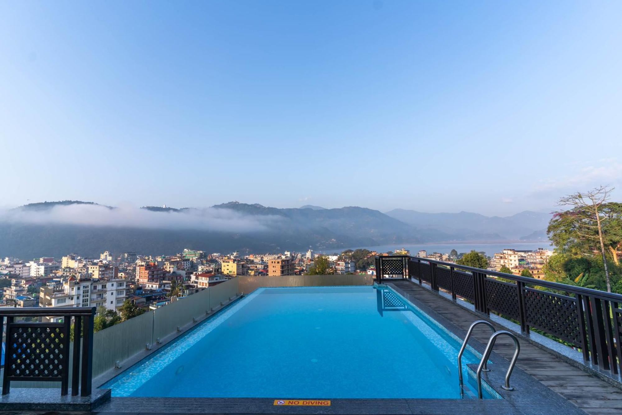 Bar Peepal Resort Pokhara Eksteriør billede View of the city from the hotel