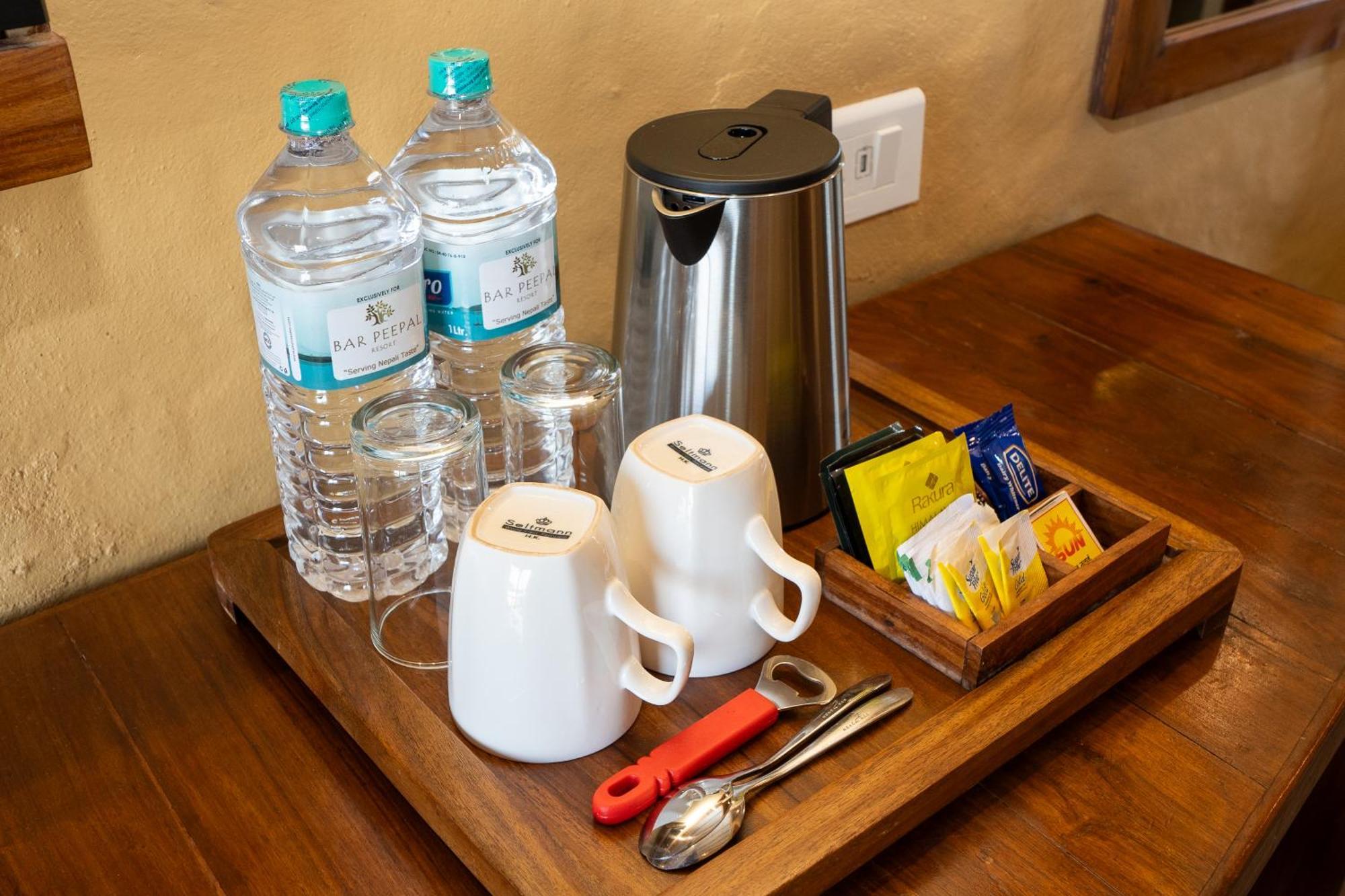 Bar Peepal Resort Pokhara Eksteriør billede A tea tray
